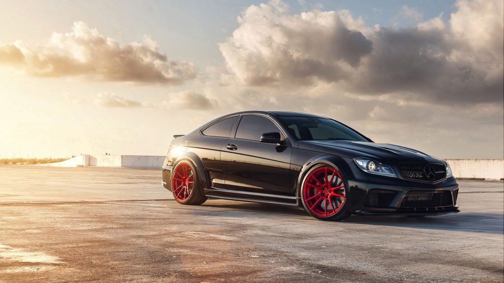 Sleek Black Mercedes Benz C63 Amg Fhd Wallpaper