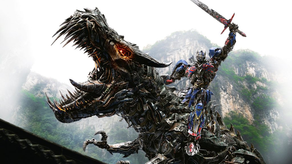 Optimus Prime On Dinobot Fight 4k Uhd Wallpaper
